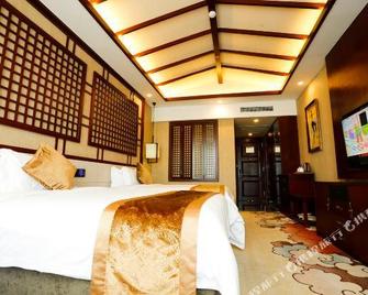 Jinhu Hotel - Ляншань - Спальня