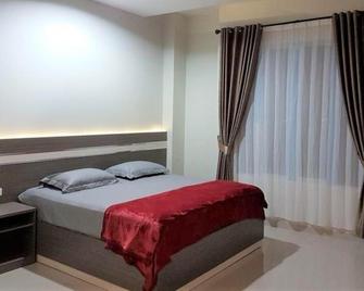 Hotel Grand Sigma - Lahat - Habitación