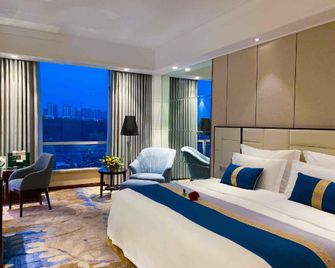 Jiucheng Hotel - Luzhou - Bedroom