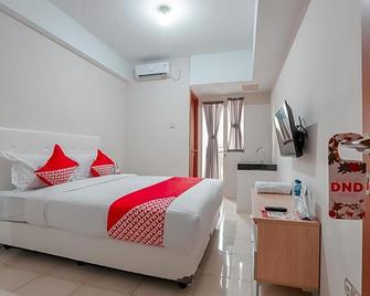 OYO 498 Green Lake View Ciputat - Pamulang - Habitación