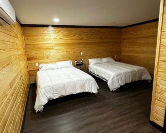 Cozy 1-bedroom with WiFi and AC in charming Timpson - Timpson - Ložnice