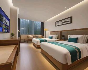 Xuyuan Hotel - Dalian - Bedroom