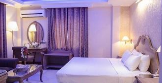 Sea Shell Hotel - Dhaka - Schlafzimmer