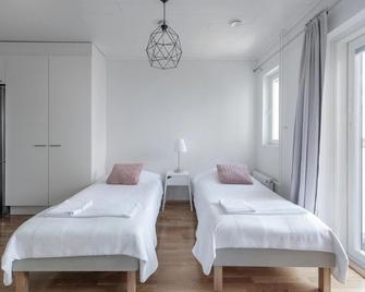 Kotimaailma Apartments Joensuu - Koulukatu 21 - Joensuu - Schlafzimmer