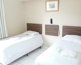 Hotel e Pousada Areia da Praia - São Vicente - Schlafzimmer