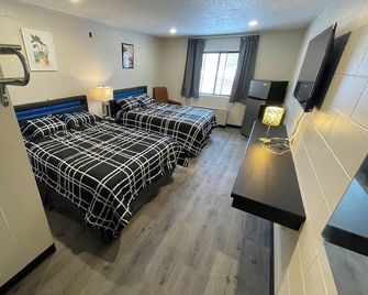 Guest Lodge - Minot - Bedroom