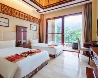 Malai Hot Spring Holiday Hotel - Baoting - Bedroom