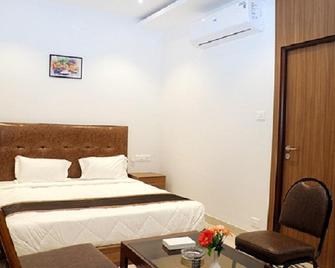 Tm Inn - Kanchipuram - Bedroom