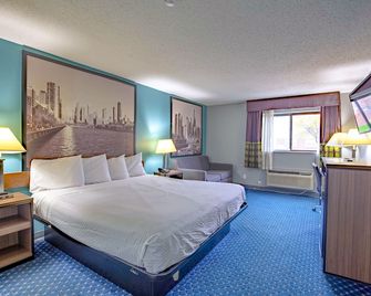 Super 8 by Wyndham Rockford I-90/Casino District - רוקפורד - חדר שינה