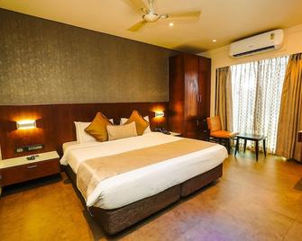 Cygnett Inn Celestiial Goa - Candolim - Bedroom