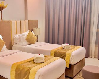 Bw Suites & Spa - Manama - Bedroom