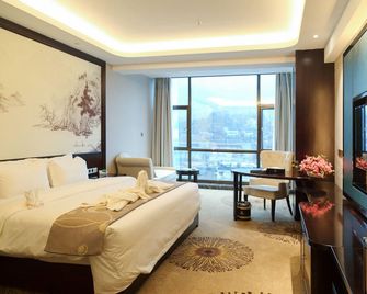 Shiqian International Hotel - Tongren - Bedroom