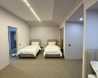 هابي مومنتس هوستل - بيشكيك - غرفة نوم