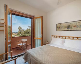 Casa Rosella by Wonderful Italy - Olbia - Slaapkamer