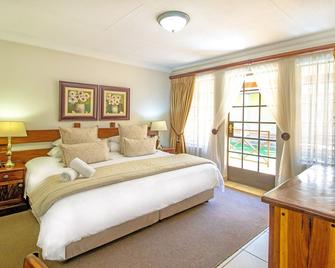 Afrique Boutique Hotel Oliver Tambo - Boksburg - Bedroom