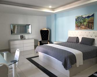 Hotel La Casona Dorada - סנטו דומינגו - חדר שינה