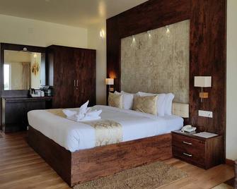 Delightz Inn Resorts - Ooty - Bedroom