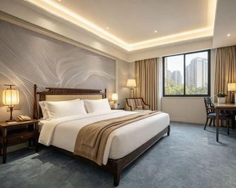 9S Garden Hotel - Tsjoengking - Slaapkamer