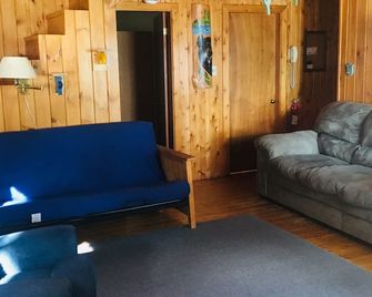 Beachfront Cottage on Ambajejus Lake With Sandy Beach and a Mountain View - Millinocket - Living room