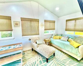 Lakefront Tiki Retreat with Hot Tub! - White Lake - Living room