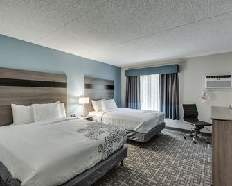 Days Inn & Suites by Wyndham Spokane - Spokane - Schlafzimmer