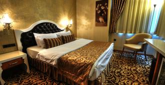 Golden Deluxe Hotel - Adana - Yatak Odası