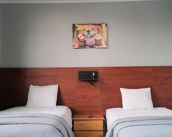 Hostal Rodinn - נאסקה - חדר שינה