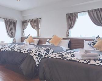 Hotel Concier Ginowan Bypass - Ginowan - Schlafzimmer