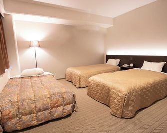 Hotel Aisul Matsuyama - מאטסויאמה - חדר שינה