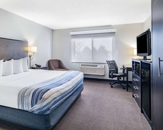 AmericInn by Wyndham Plover Stevens Point - Plover - Makuuhuone