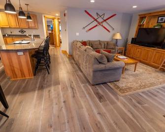 Beautiful Jay Peak ski-in/ski-out condo w/HOT TUB! - North Troy - Living room