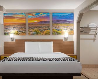 Days Inn by Wyndham Covington - Covington - Schlafzimmer