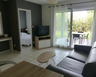 Le Jardin de Babylone 'réservé aux couples uniquement' - Cap d'Agde - Вітальня