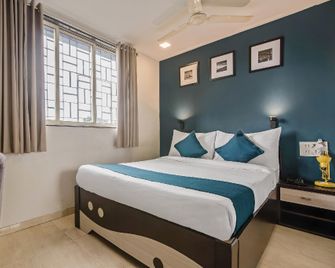 Hotel O Nirsukh Palace - Navi Mumbai - Ložnice