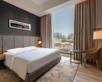 Park Inn by Radisson Jabalpur - Jabalpur - Slaapkamer