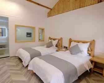 Yishui Yuntian Hostel - Lijiang - Habitación