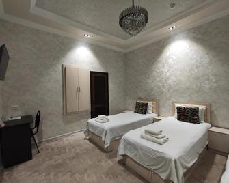 Hotel Suzani Samarkand - Samarqand - Schlafzimmer