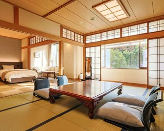 Dogo Onsen Hotel Tsubakikan - Matsuyama - Sovrum
