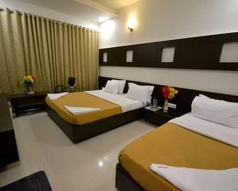 Hotel Dhantara - Shirdi - Slaapkamer