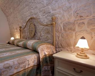 Masseria Casa Busciana - Castellana Grotte - Camera da letto