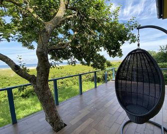Skaerven Beachfront Condos and Cottage - Nyborg - Balkon