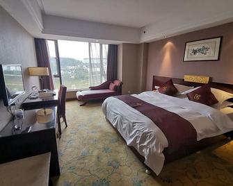 Wuyuan Scenic Hotel - Jingdezhen - Camera da letto