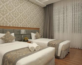 Le Duy Grand Hotel - Ho Chi Minh City - Bedroom
