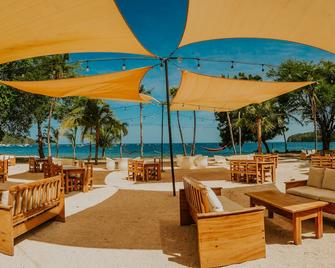 Café de Playa Beach Front Hotel - Coco - Patio