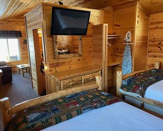 Badlands Frontier Cabins - Wall - Bedroom