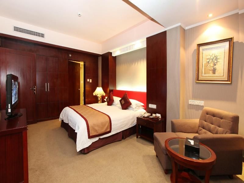 New Century Pujiang Hotel - ז'ינהואה - חדר שינה