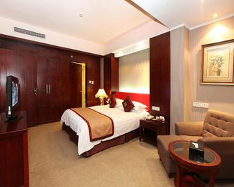 New Century Pujiang Hotel - Jinhua - Schlafzimmer
