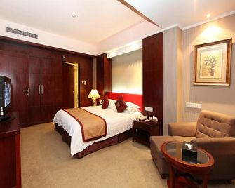 New Century Pujiang Hotel - ז'ינהואה - חדר שינה