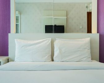 City View 1BR Apartment at Woodland Park Residence By Travelio - Jakarta - Chambre