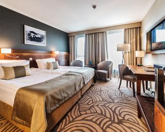 إيربورت هوتل أوكيسي - وارسو - غرفة نوم